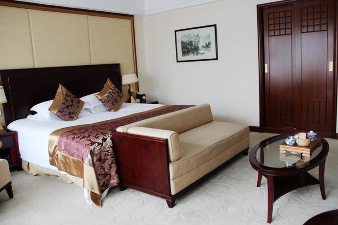 Imagen de la habitación del Hotel Zhejiang Hotel. Foto 4