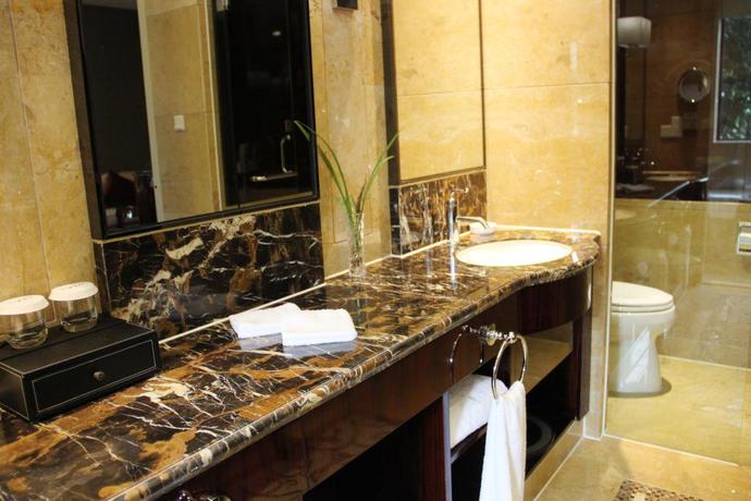 Imagen de la habitación del Hotel Zhejiang Hotel. Foto 6