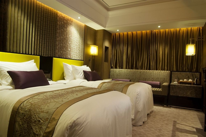 Imagen de la habitación del Hotel Zhejiang International. Foto 4