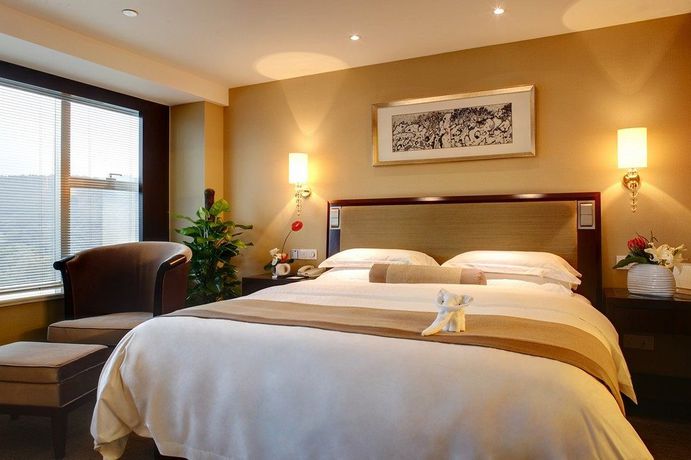 Imagen de la habitación del Hotel Zhejiang Narada Grand. Foto 11