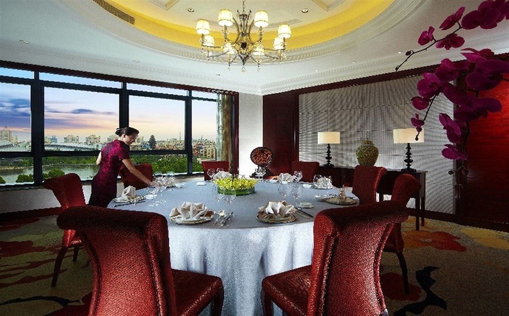 Imagen del bar/restaurante del Hotel Zhejiang Sanli New Century Grand Hangzhou. Foto 2