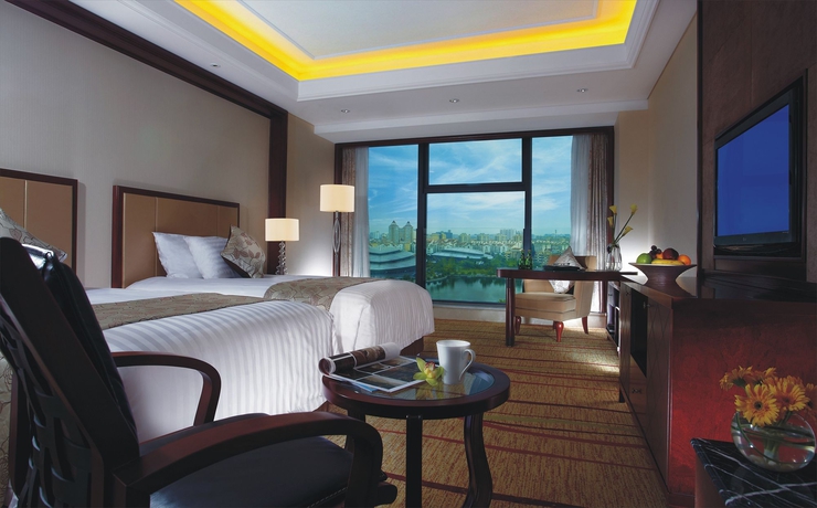 Imagen de la habitación del Hotel Zhejiang Sanli New Century Grand Hangzhou. Foto 4