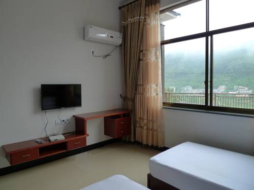 Imagen de la habitación del Hotel Zhejiang Valley Inn. Foto 2