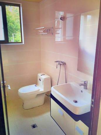 Imagen de la habitación del Hotel Zhejiang Valley Inn. Foto 6