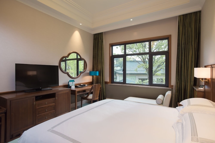Imagen de la habitación del Hotel Zhejiang Xizi. Foto 3