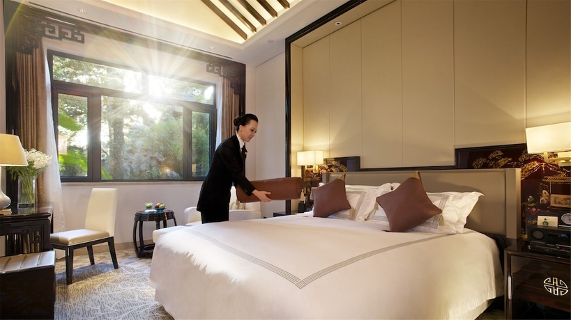 Imagen de la habitación del Hotel Zhejiang Xizi. Foto 14