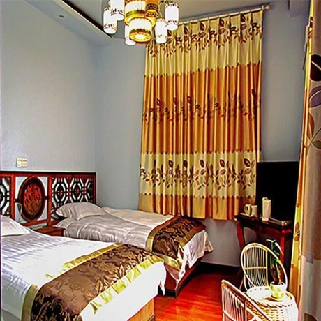 Imagen de la habitación del Hotel Zhen Shui Ren Jia Kezhen. Foto 10