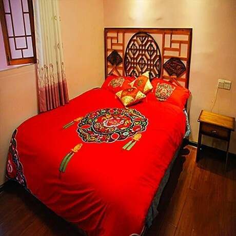 Imagen de la habitación del Hotel Zhen Shui Ren Jia Kezhen. Foto 13