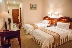 Imagen de la habitación del Hotel Zhen Xing Hotel. Foto 2
