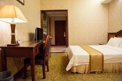 Imagen de la habitación del Hotel Zhen Xing Hotel. Foto 4