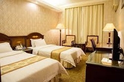 Imagen de la habitación del Hotel Zhen Xing Hotel. Foto 5