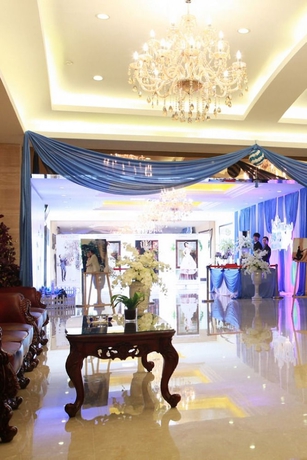 Imagen de los interiores del Hotel Zhenbao Holiday Nanjing Yuhua. Foto 8