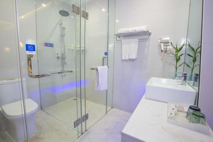 Imagen de la habitación del Hotel Zhengzhou An Xin Bo Ke. Foto 8