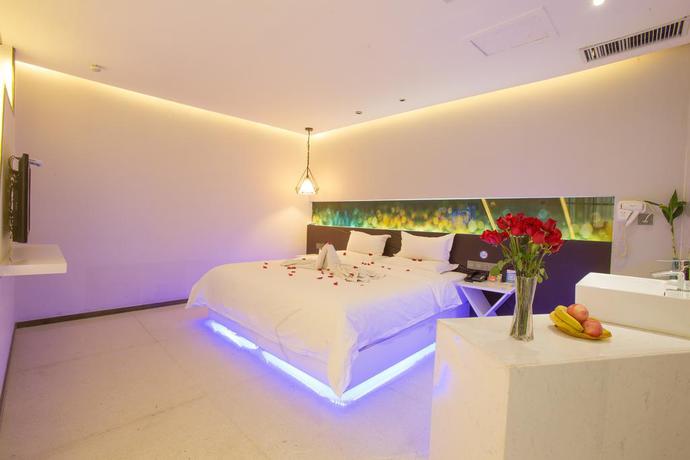 Imagen de la habitación del Hotel Zhengzhou An Xin Bo Ke. Foto 10