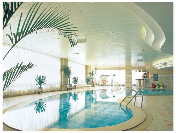 Imagen de la piscina del Hotel Zhengzhou Jianguo. Foto 11