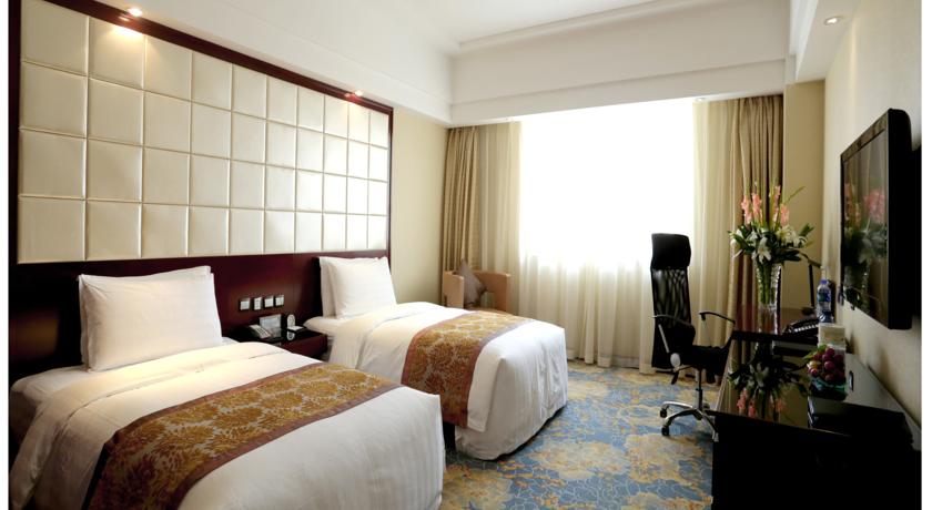 Imagen de la habitación del Hotel Zhengzhou Jianguo. Foto 9
