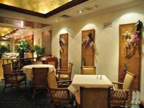 Imagen general del Hotel Zhengzhou Yiquan International. Foto 7