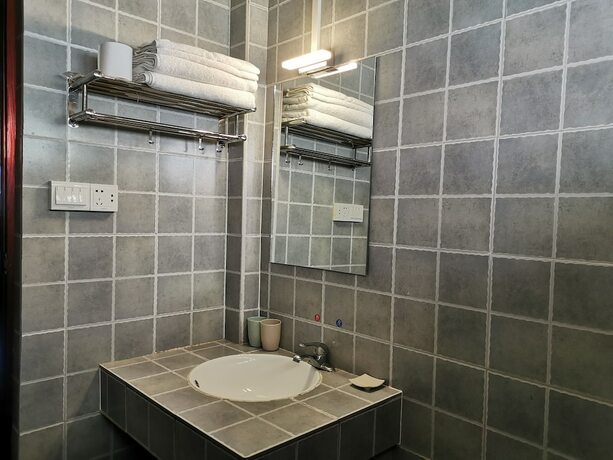 Imagen de la habitación del Hotel Zhenyuan Qiemanman Kezhan. Foto 5