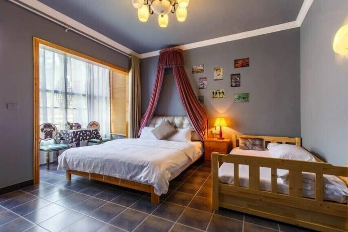 Imagen de la habitación del Hotel Zhenyuan Qiemanman Kezhan. Foto 9