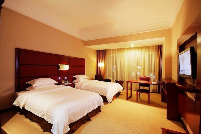 Imagen de la habitación del Hotel Zheshang Hotel - Nanning. Foto 2