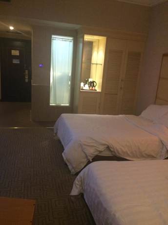 Imagen de la habitación del Hotel Zheshang Hotel - Nanning. Foto 5