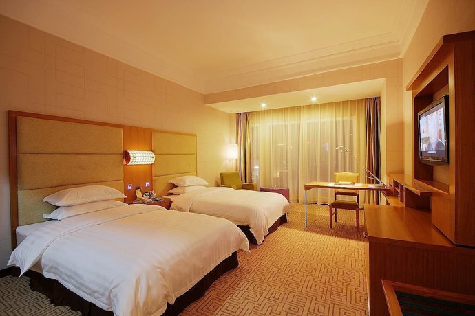 Imagen de la habitación del Hotel Zheshang Hotel - Nanning. Foto 7