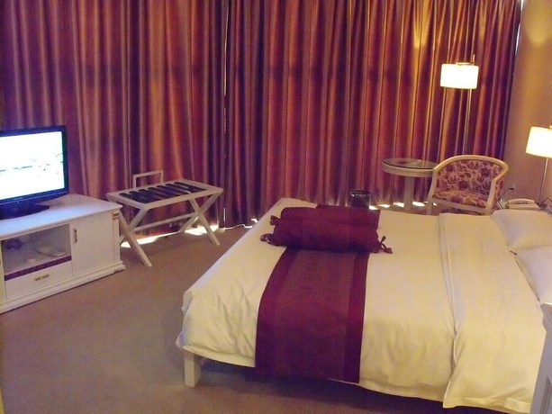 Imagen de la habitación del Hotel Zheshang Hotel - Nanning. Foto 8