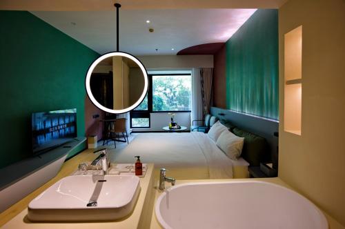 Imagen de la habitación del Hotel Zhi Resort Beijing. Foto 4