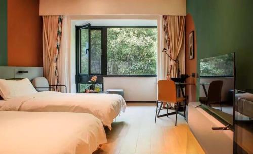Imagen de la habitación del Hotel Zhi Resort Beijing. Foto 5