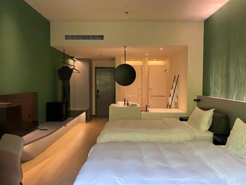 Imagen de la habitación del Hotel Zhi Resort Beijing. Foto 6