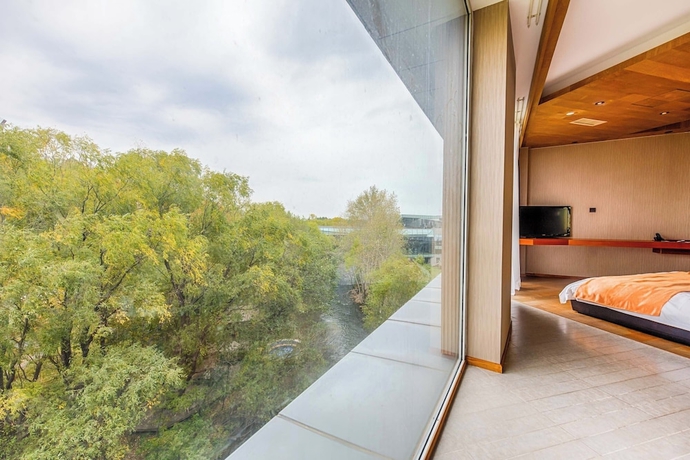 Imagen de la habitación del Hotel Zhi Resort Riverside. Foto 6