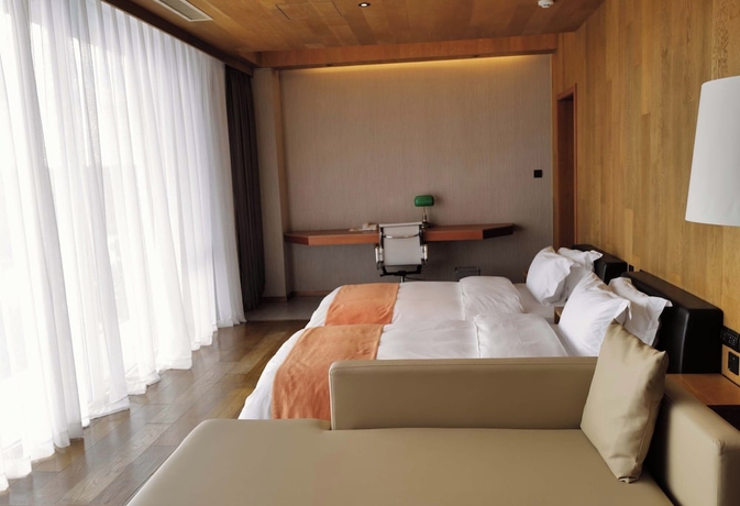 Imagen de la habitación del Hotel Zhi Resort Riverside. Foto 10