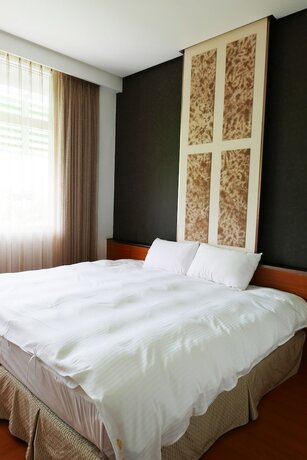 Imagen de la habitación del Hotel Zhida Craft Service Guest House. Foto 17