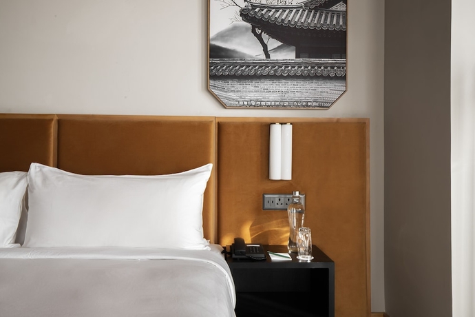 Imagen de la habitación del Hotel Zhiwa Ling Heritage. Foto 3