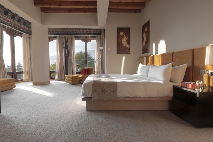 Imagen de la habitación del Hotel Zhiwa Ling Heritage. Foto 4