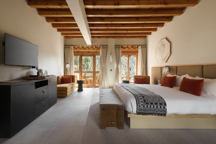 Imagen de la habitación del Hotel Zhiwa Ling Heritage. Foto 6