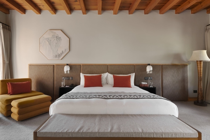 Imagen de la habitación del Hotel Zhiwa Ling Heritage. Foto 8