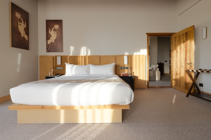 Imagen de la habitación del Hotel Zhiwa Ling Heritage. Foto 10