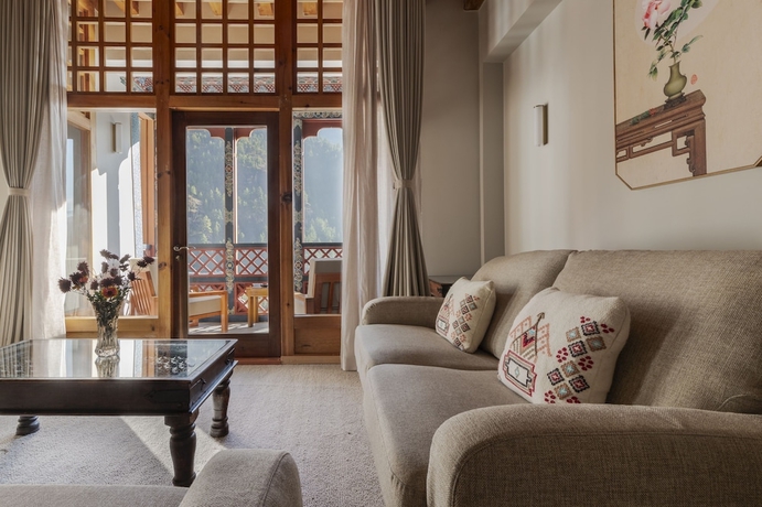 Imagen de la habitación del Hotel Zhiwa Ling Heritage. Foto 12