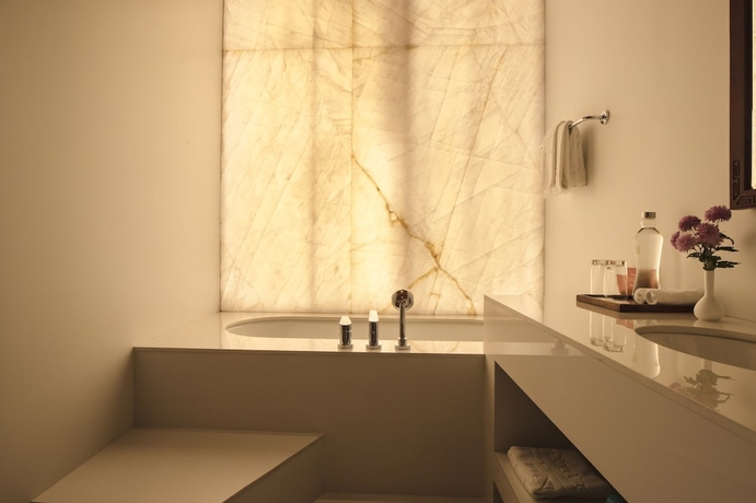 Imagen de la habitación del Hotel Zhiwa Ling Heritage. Foto 17