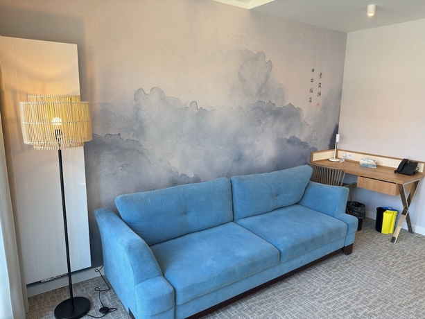 Imagen de la habitación del Hotel Zhong Hua. Foto 5