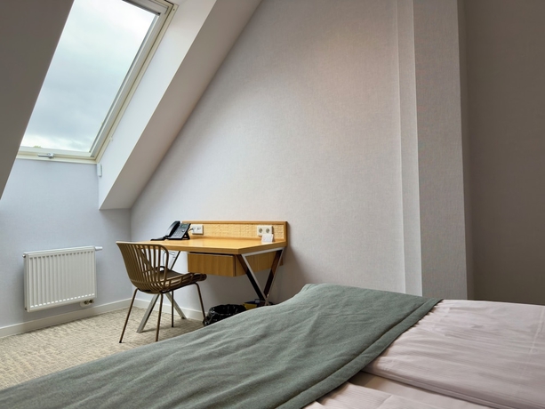 Imagen de la habitación del Hotel Zhong Hua. Foto 12