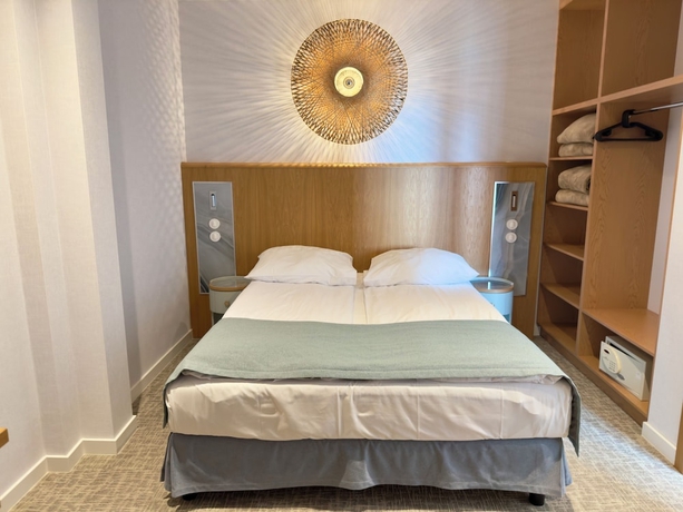 Imagen de la habitación del Hotel Zhong Hua. Foto 13