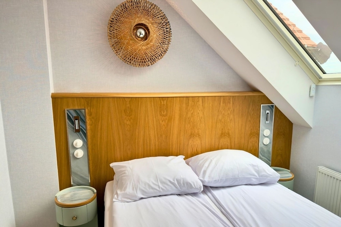 Imagen de la habitación del Hotel Zhong Hua. Foto 16