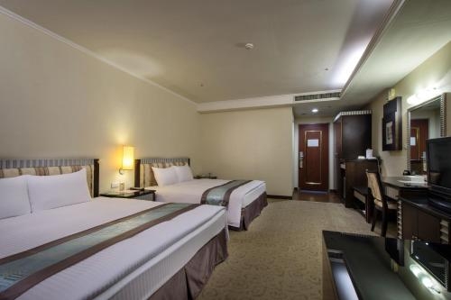Imagen de la habitación del Hotel Zhong Ke. Foto 7