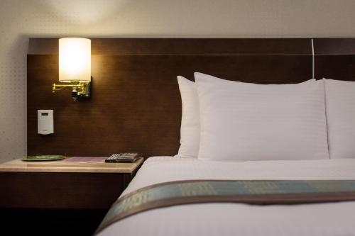 Imagen de la habitación del Hotel Zhong Ke. Foto 8