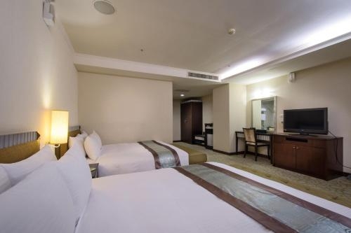 Imagen de la habitación del Hotel Zhong Ke. Foto 9