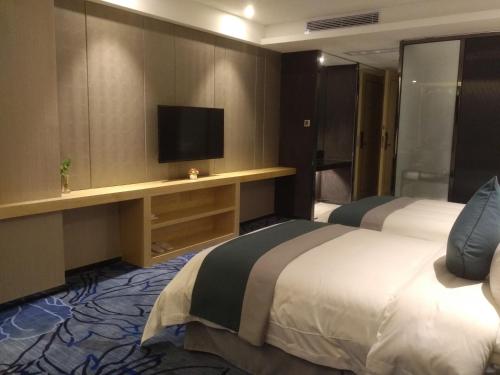 Imagen de la habitación del Hotel Zhong Tian Mayfair. Foto 4