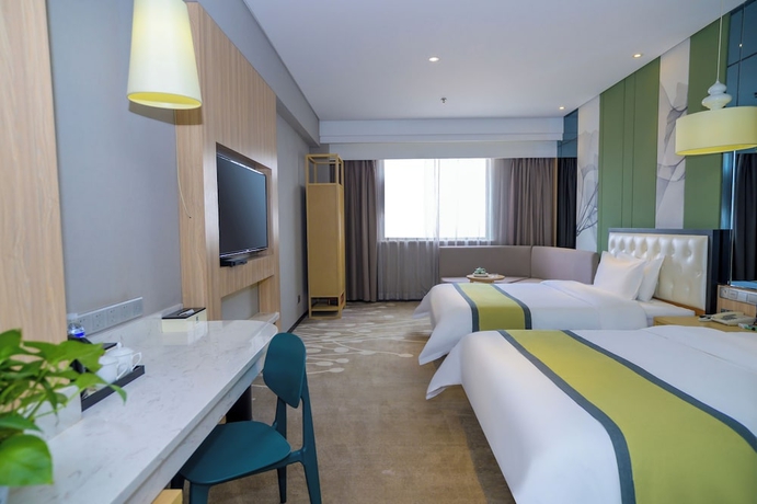 Imagen de la habitación del Hotel Zhong Zhou Elegance. Foto 8