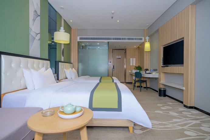 Imagen de la habitación del Hotel Zhong Zhou Elegance. Foto 9